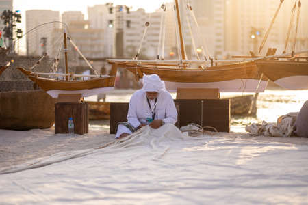 Man Making traditional sail ship in qasr al hosn festival in Abu Dhabi in February 15, 2015のeditorial素材