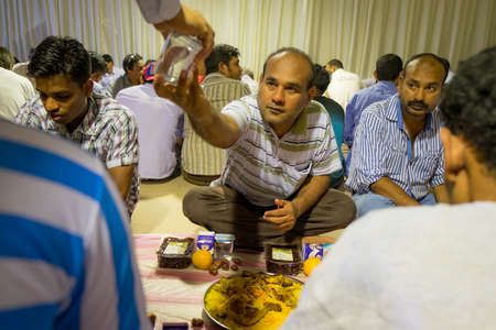 a few moments before iftar time in outdoor tent in Abu Dhabi  in July 28, 2014のeditorial素材