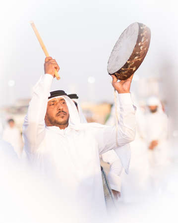 Men perfume yola dance in western region Abu Dhabi in february 12, 2015のeditorial素材