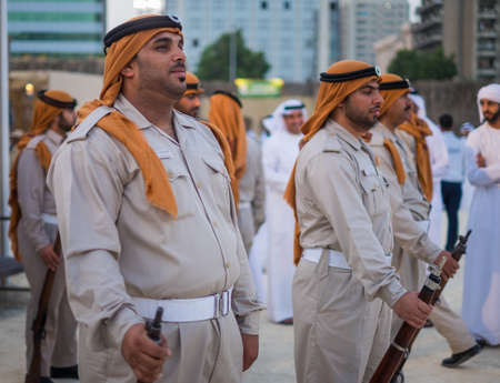 UAE traditional police dress form qasr al hosn festival in Abu Dhabi in February 15, 2015のeditorial素材