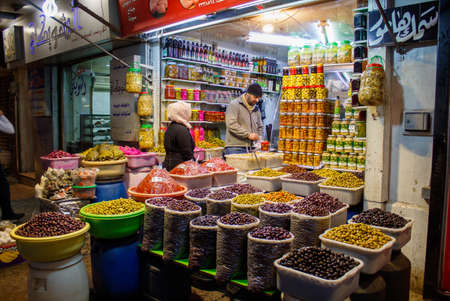 Traditional street food  and olives inside Hamidiyahs Souq  located inside the old walled city of Damascus, Syria, 22/12/2019のeditorial素材