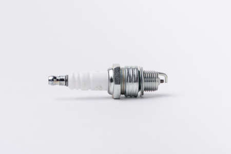 Car spark plugs on whiteの写真素材
