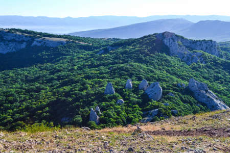 Top view of huge stones on a journey to a mysterious place of power known as the Temple of the sun in the mountainsの写真素材