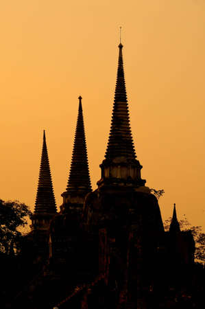 Silhouette of Ruin temple, Thailand.の写真素材