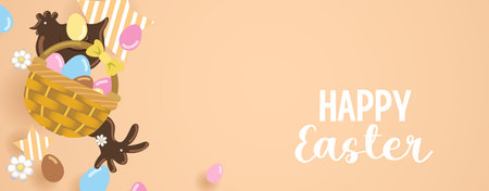 Wicker basket with chocolate easter eggs and chocolate chicken and rabbit. Springtime happy easter...