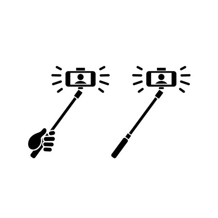 Hand holding selfie stick taking picture icon vector symbol.のイラスト素材