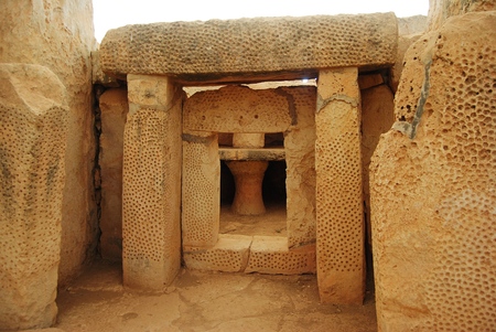 Mnajdra, Malta - September 22, 2013. Structures of Mnajdra megalithic temple - one of the best preserved and most evocative of Malta's prehistoric sites, with megaliths piled to form a window.のeditorial素材