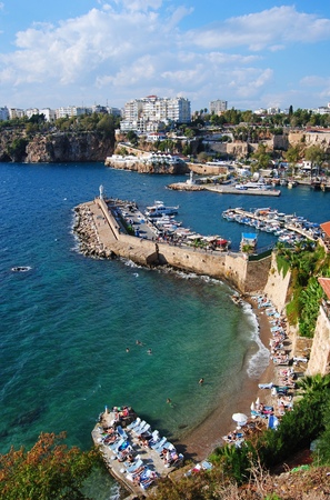 Antalya, Turkey - October 31, 2014. View over Antalya harbour with buildings, boats and people.のeditorial素材