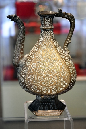 Kuala Lumpur, Malaysia - November 30, 2015. Cast brass kettle at the Islamic Arts Museum in Kuala Lumpur. South India, 17th century AD.のeditorial素材