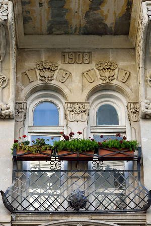 Baku, Azerbaijan - July 23, 2017. Balcony of architectural building in downtown Baku, with flowers and ornaments.のeditorial素材