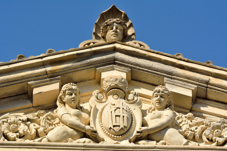 Baku, Azerbaijan - July 23, 2017.  Sculptures of women on facade of architectural building in downtown Baku.のeditorial素材