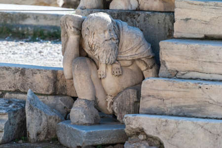 Ancient statue among the ruins of Acropolis of Athens in Greece.のeditorial素材