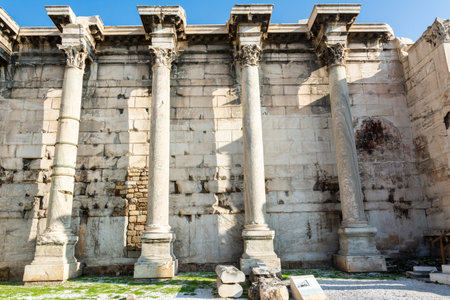 Athens, Greece â November 18, 2016. West wall of the ruined Library of Hadrian in Athens, with columns. The vast 2nd-century-AD library, the largest structure erected by Hadrian.のeditorial素材