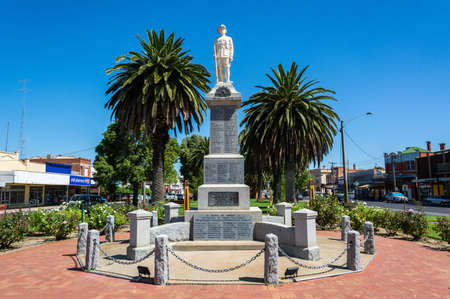 Nhill, Victoria, Australia - March 3, 2017. War memorial in downtown Nhill, Victoria, with buildings and cars.のeditorial素材