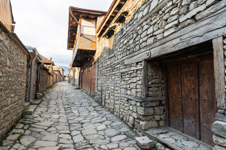 Lahic, Ismayilli region, Azerbaijan - April 27, 2019. Cobblestone Huseynov street in Lagic village...
