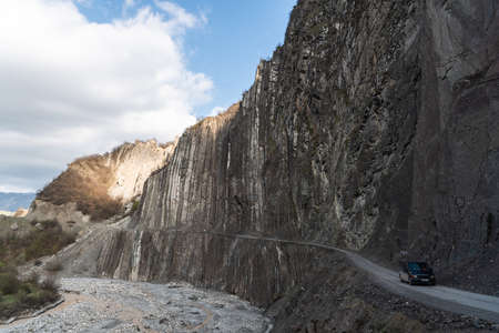 Lahic, Ismayilli region, Azerbaijan - April 27, 2019. Mountainous road leading to Lahic village in Ismayill region of Azerbaijan, with car.のeditorial素材