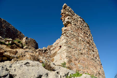 Ruined wall of Selimiye castle near Selimiye village on the Bozburun peninsula in Mugla province of Turkey.の写真素材