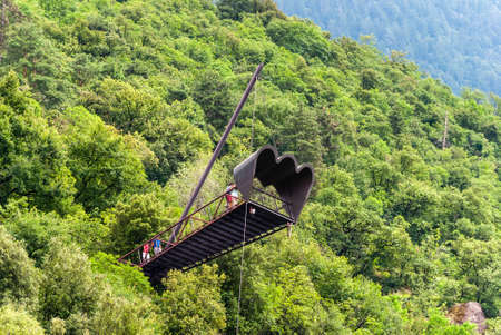 Merano, South Tirol, Italy â July 4, 2016. Il Binocolo viewing platform in the Gardens of Trauttmansdorff Castle in Merano, Italy. View with people in summer.のeditorial素材