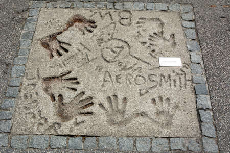 Munich, Germany â July 1, 2016. Mark of American rock band Aerosmith with hands and signets in the concrete at the Olympic Walk of Stars in Munich.のeditorial素材