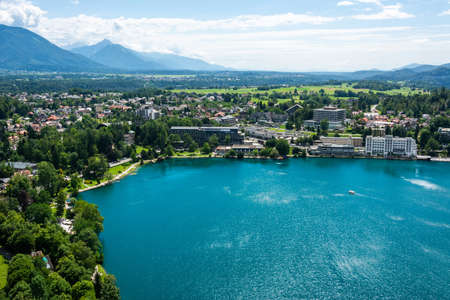 Bled, Slovenia â July 6, 2019. View over Bled town on the shore of Lake Bled in Slovenia. View with commercial properties and residential buildings in summer.のeditorial素材
