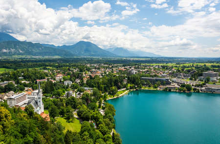 Bled, Slovenia â July 6, 2019. View over Bled town on the shore of Lake Bled in Slovenia. View with commercial properties and residential buildings in summer.のeditorial素材