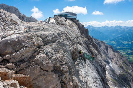 Ramsau am Dachstein, Austria â July 10, 2016. Mountainous landscape with Stairway to Nothingness site of Dachstein Skywalk in Austria.のeditorial素材
