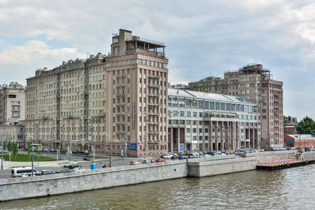 Moscow, Russia â June 11, 2017. Exterior view of the Moscow State Estrade Theatre on Bersenev Embankment in Moscow, with surrounding residential buildings, cars and people.のeditorial素材