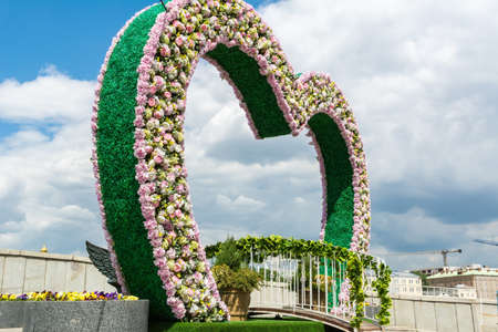 Moscow, Russia â June 11, 2017. Temporary heart-shaped installation filled with flowers in Moscow.のeditorial素材