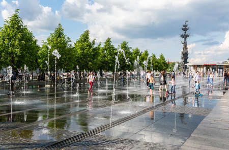 Moscow, Russia â June 11, 2017. Walkable fountain in Gorky Park in Moscow, with people.のeditorial素材