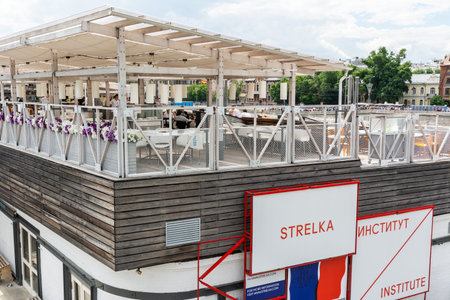 Moscow, Russia â€“ June 11, 2017. Summer terrace of Strelka Bar, a part of Strelka Institute in...