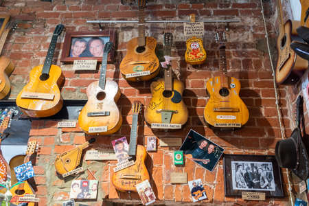 Kazan, Russia â June 28, 2017.  Display of acoustic guitars signed by prominent Russian artists, including Leonid Agutin, Lev Leshchenko, Yury Antonov, Lube band, at Soviet Lifestyle Museum in Kazan, Russia.のeditorial素材