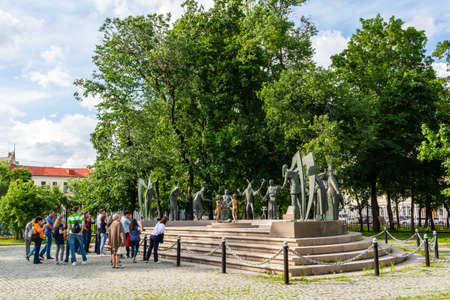 Moscow, Russia â July 1, 2017. Group of people in front of Children are Victims of Adultsâ Vices sculpture by Mikhail Shemyakin at Bolotnaya Ploshchad square in Moscow.のeditorial素材