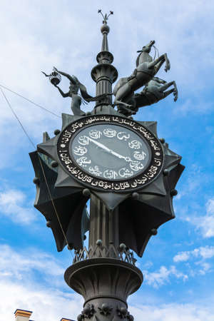 Kazan, Russia â June 23, 2017. Detail of clock tower on Bauman street in Kazan, with clock dial, statues and Arabic inscriptions.のeditorial素材
