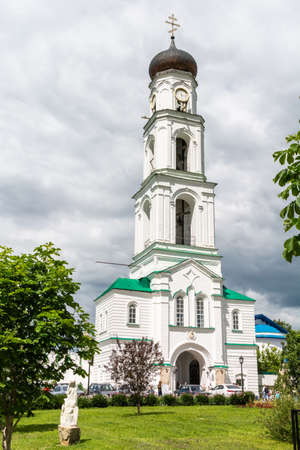 Raifa, Tatarstan, Russia â June 25, 2017. Bell tower of the Raifa Monastery of the Mother of God. The monastery was established in 1613 and the bell tower was built in 1889. View with people in summer.のeditorial素材