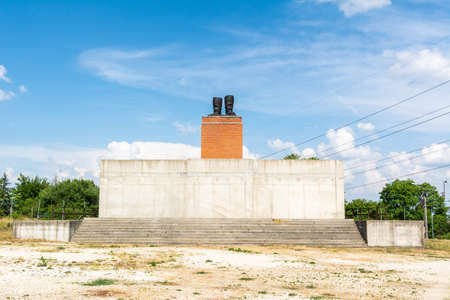 Budapest, Hungary â June 6, 2017. Huge pedestal with a pair of Stalinâs boots at Memento park in Budapest. This is a reference to the 1956 revolution, when the largest Budapest statue of the recently-deceased Soviet leader was knocked down, and only tのeditorial素材