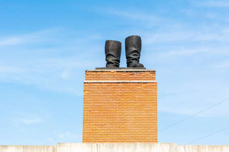 Budapest, Hungary â June 6, 2017. Budapest, Hungary â June 6, 2017. Huge pedestal with a replica of Stalinâs boots at Memento park in Budapest. This is a reference to the 1956 revolution, when the largest Budapest statue of the recently-deceased Sovのeditorial素材