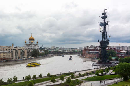 Moscow, Russia â July 7, 2017. View of Gorky Park and Moskva River waterfront in Moscow, in summer. View toward Peter the Great Statue, Christ the Saviour Cathedral and Red October factory building, on a cloudy summer day.のeditorial素材