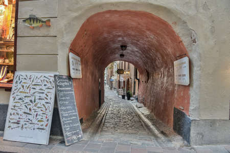 Stockholm, Sweden - November 22, 2018. Narrow passage in Gamla Stan historic district of Stockholm.のeditorial素材