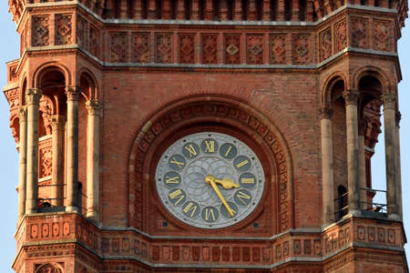 Berlin, Germany - November 11, 2018. Architectural detail of Rotes Rathaus town hall building in Berlin, with clock.のeditorial素材