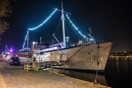 Stockholm, Sweden - November 17, 2018. Former royal yacht housing Lady Patricia restaurant and bar in Stockholm, at night.のeditorial素材