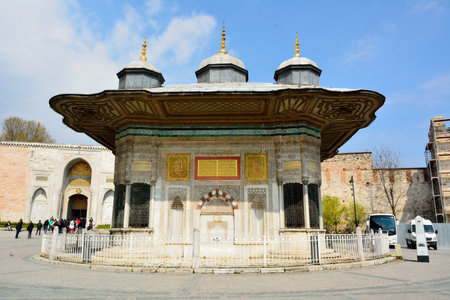 Istanbul, Turkey - April 23, 2017. The Fountain of Sultan Ahmed III, located in front of the Imperial Gate of Topkapi Palace in Istanbul, with people.のeditorial素材
