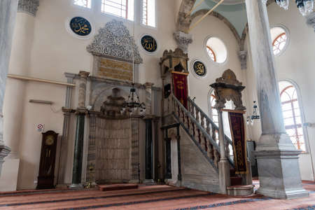 Izmir, Turkey - January 26, 2019. Interior view of Kestanepazari mosque, dating from 1668, in Izmir, with prayer hall, mihrab and minbar.のeditorial素材