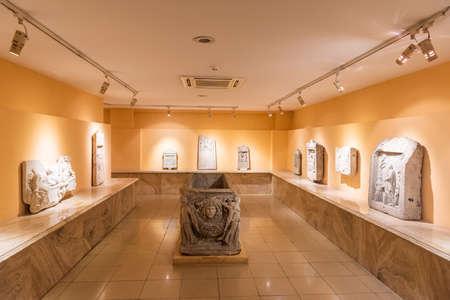 Izmir, Turkey - January 25, 2019. Interior view of Izmir Museum of History and Art in Izmir, with ancient sculptures.のeditorial素材