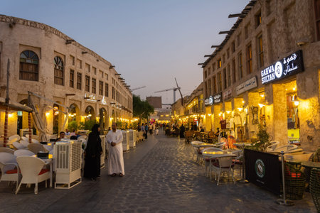 Doha, Qatar - November 3, 2016. Street view in Souq Waqif market in Doha, with historic buildings,...