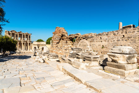 Ephesus, Turkey â November 2, 2020. The Curetes Way at Ephesus ancient site in Turkey. View toward the Library of Celsus, with ancient ruins, without people. The Curetes Way was the main thoroughfare of Ephesus, lined with statuary, great buildings and のeditorial素材