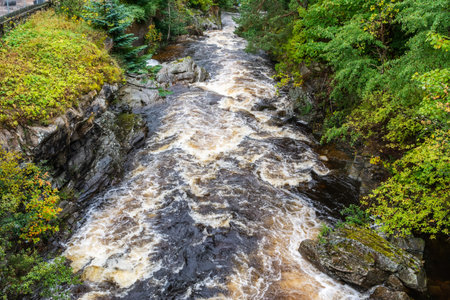View of Clunie Water river in Aberdeenshire, Scotland. It is a tributary of the River Dee, joining the river at Braemar.の写真素材