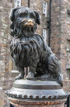 Edinburgh, United Kingdom â September 8, 2017. Greyfriars Bobby statue outside Greyfriars Kirkyard in Edinburgh. From 1858 to 1872, the wee Skye terrier maintained a vigil over the grave of his master, an Edinburgh police officer. The life-size statue oのeditorial素材