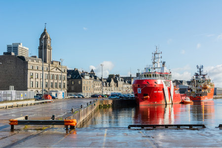 Aberdeen, United Kingdom â September 15, 2017. View of the Regent Quay area in Aberdeen, with buildings and VOS Famous standby safety vessel.のeditorial素材