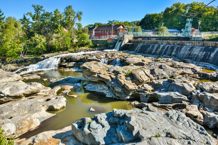 Shelburne Falls, Massachusetts, USA - September 15, 2016. Glacial potholes of the Deerfield River in Shelburne Falls, MA. Potholes were ground out of granite during high water of the glacial age by whirlpool action of water and gyrating stones of various のeditorial素材