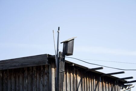 Birdhouse on a background of the sky. Photo.の写真素材